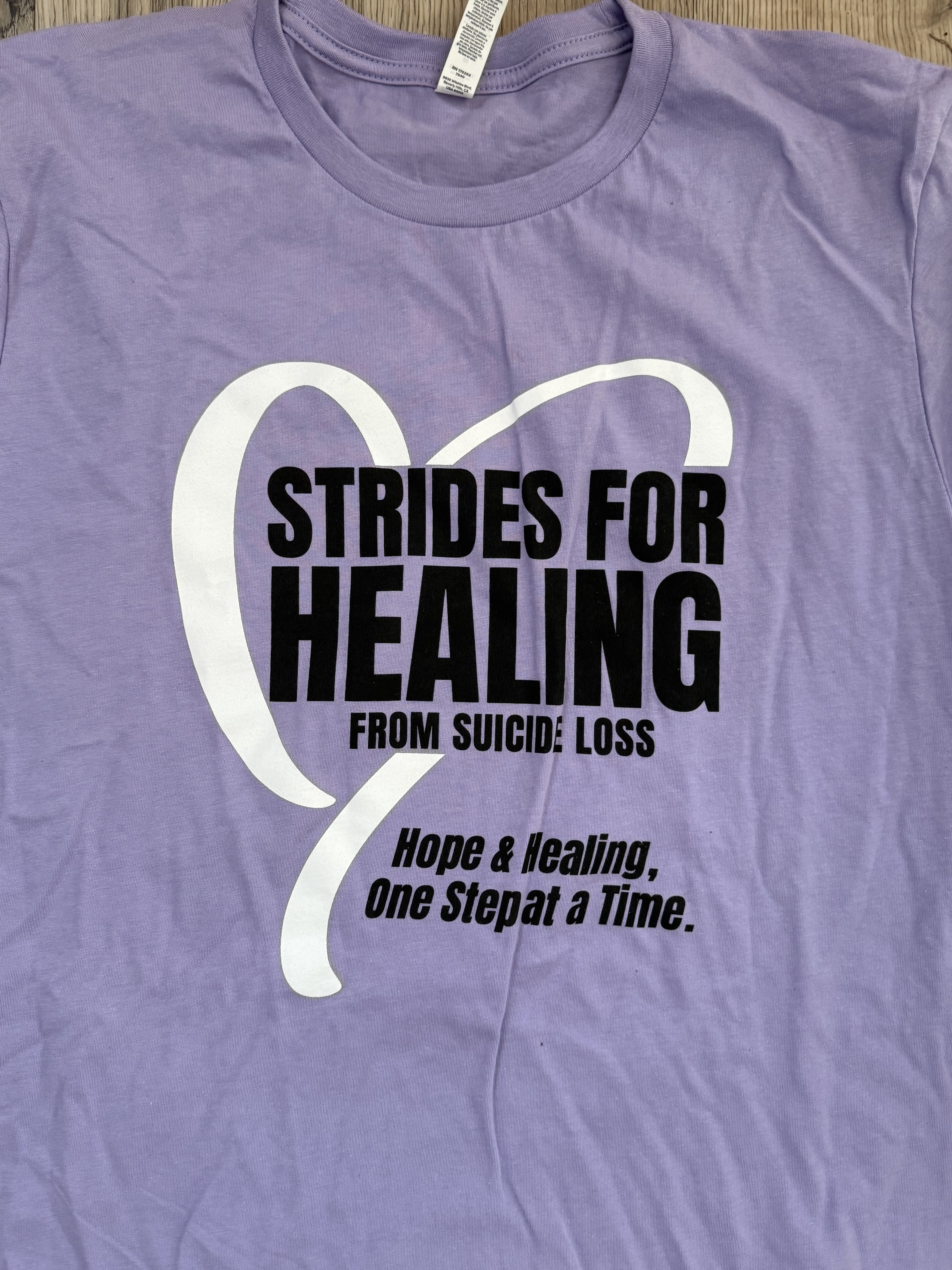 Front of the purple Strides for Healing T-shirt